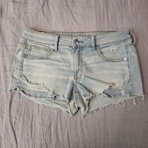 America Eagle Low Rise Shortie denim shorts lace pocket